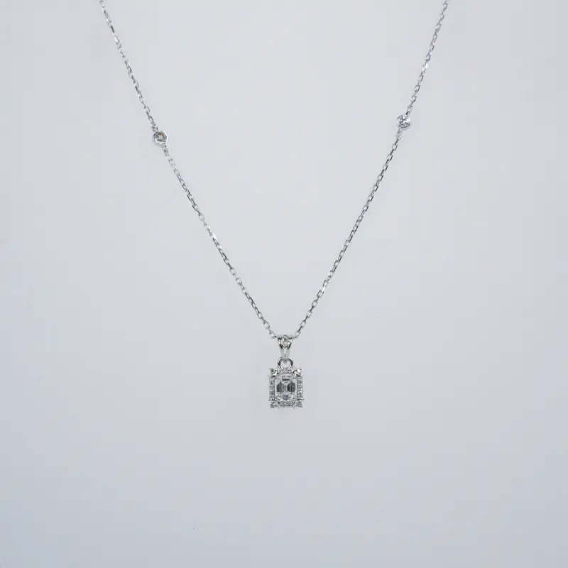 EVELYN EMERALD CUT HALO NECKLACE