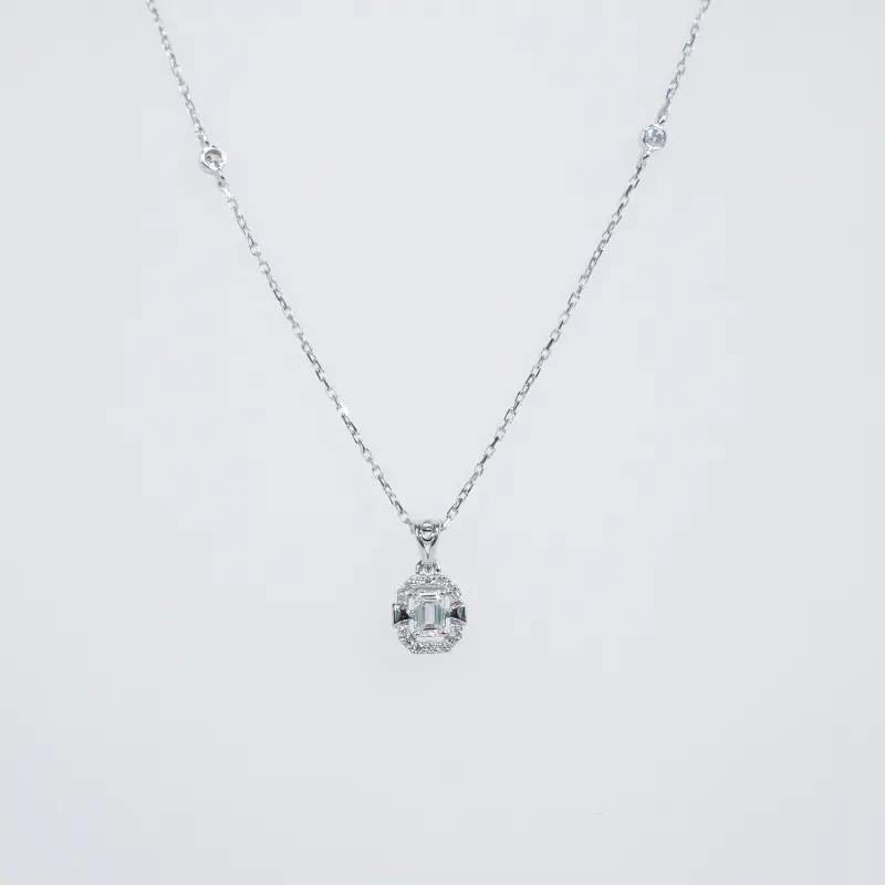 SEQUENCE EMERALD AND HALO NECKLACE